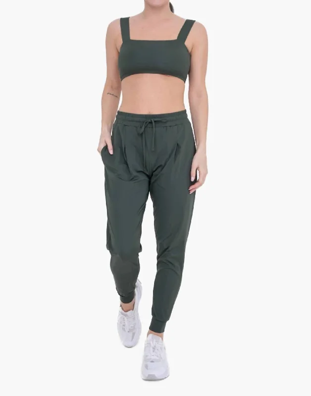 Solid Pleated Front Joggers In Deep Forest